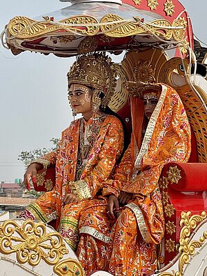 Rama and Sita open a street pageant in Janakpur.
