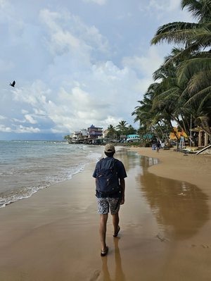 Zinpa Gyaltsen Budha walking on the beach.