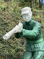 Statue of a soldier ready for combat at a matyr's park. Photo courtesy of Stefanie Lotter.