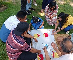 An interaction between kids and parents while playing gatti.